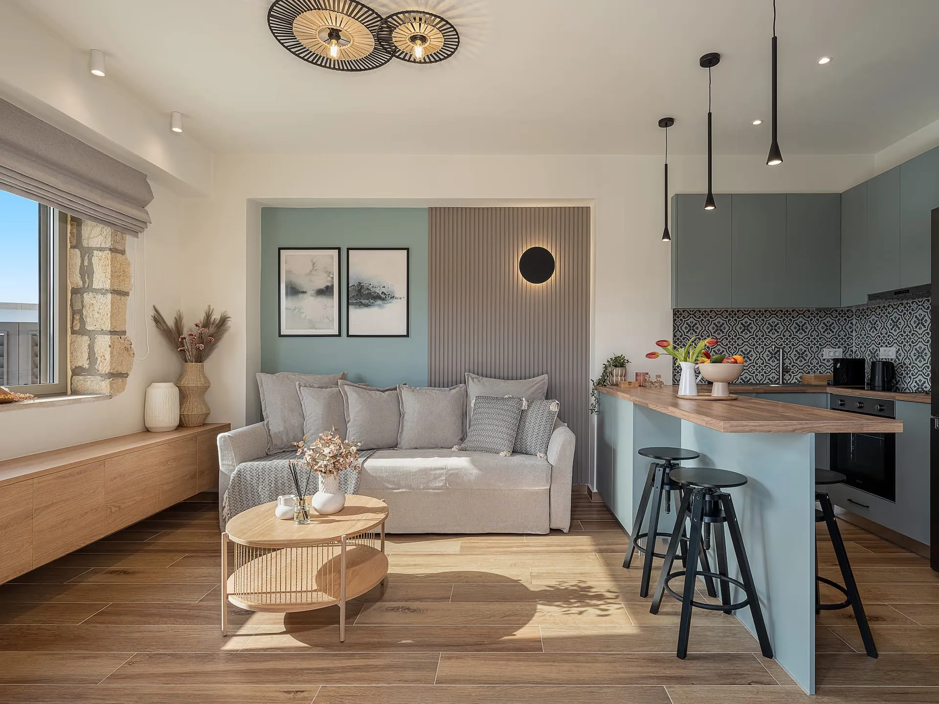 Modern open-plan living room and kitchen with stylish decor.